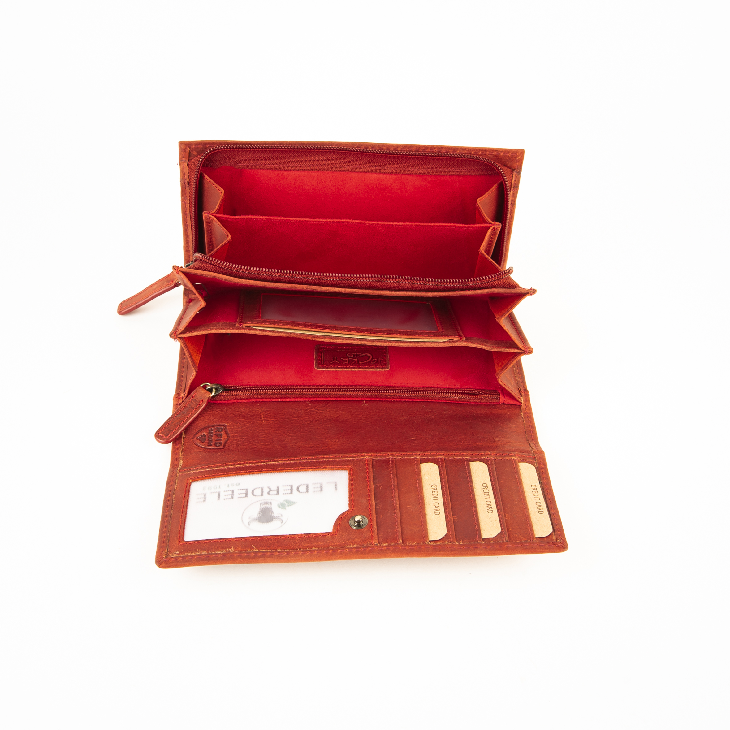 Jockey Club Toro Damenbörse Reißverschluss, rot. Echtleder Portemonnaie Damen, Vintage, pflanzlich gegerbt. Lederwaren Ostwestfalen, Lederdeele Delbrück_05 Jockey Club Toro Damenbörse mit Reißverschluss Münzfach in rot. Echtleder Portemonnaie für Damen aus pflanzlich gegerbtem Rindleder. Naturleder, Slow Fashion, Vintage. Lange Damenbörse mit Überschlag und doppeltem Druckknopfverschluss. Lederdeele Delbrück, Paderborn. Lederwaren in Ostwestfalen. Ansicht Innenansicht